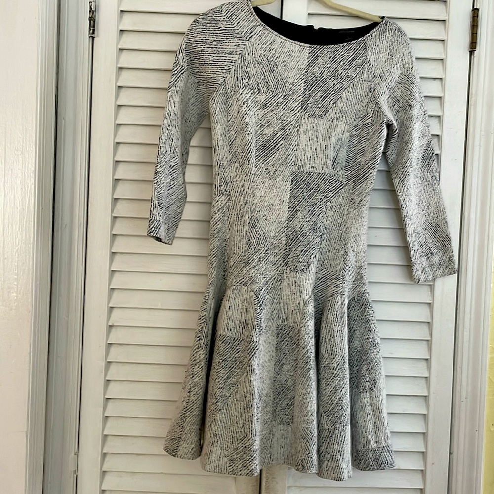 Beautiful Banana Republic dress for spring with flare bottom.